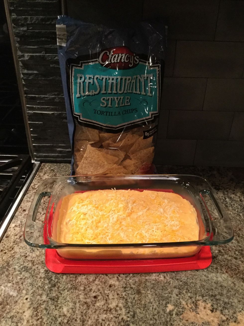 Summary: Drain chicken. Combine chicken, cream cheese, ranch and hot sauce in saucepan. Stir until hot. Pour into 9x13 pan. Sprinkle cheese on top. Serve with chips. ENJOY!!!!!