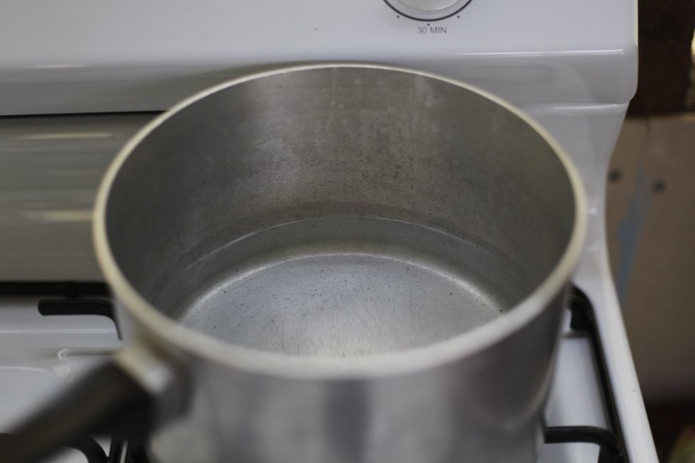 Super Easy tempered Chocolate: Fill up the pot with about 1 litre of water and boil the absolute begeezus out of it. Let it boil vigorously and then switch it off. Weird I know but work with me. ;)