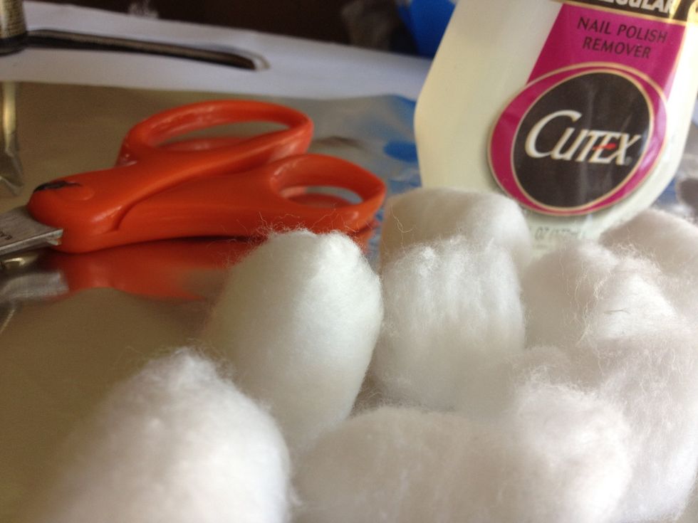 Supplies.( cotton balls, nail polish remover, and foil.)