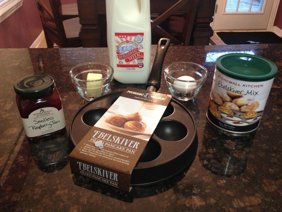 Supplies: Ebelskiver Pan, Ebelskiver Mix, whole milk, butter, egg, & any fillings.