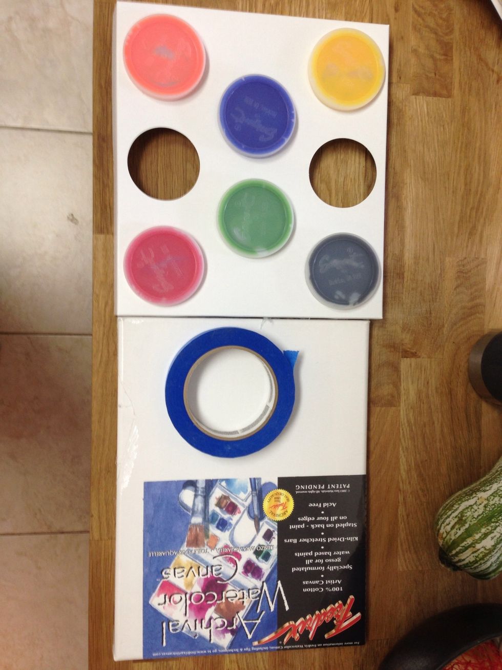 Supplies. Fingerpaint, art paper, painters tape for your message