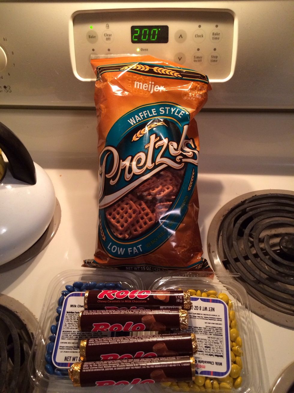 Supplies. For this batch I was doing snacks for a tailgate party so I used appropriately colored candies on top. Normally for the holidays I do "turtles" with pecans on top instead.