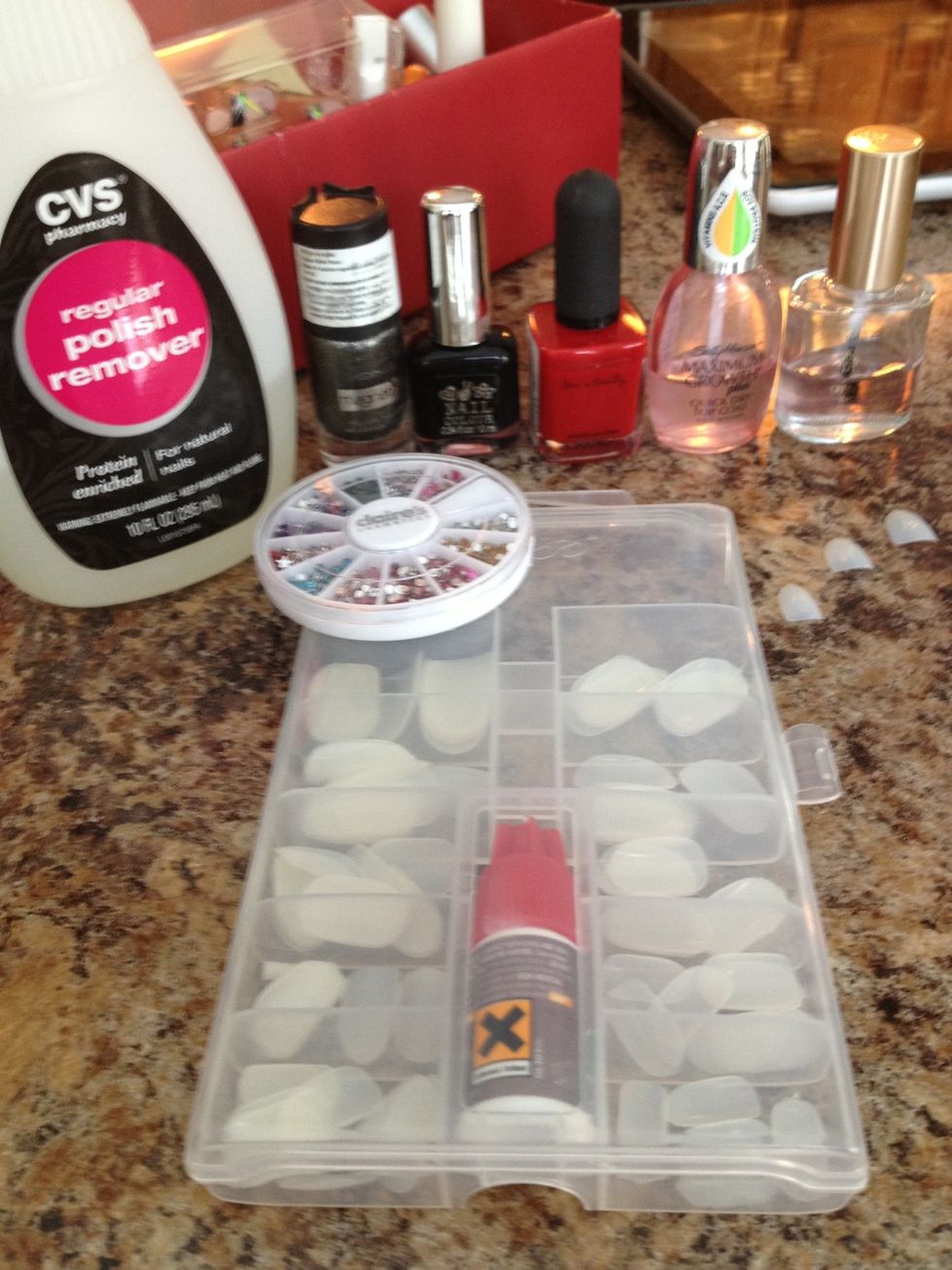 Supplies. I got the plain fake nails at a CVS, but I think you can get it at any pharmacy.