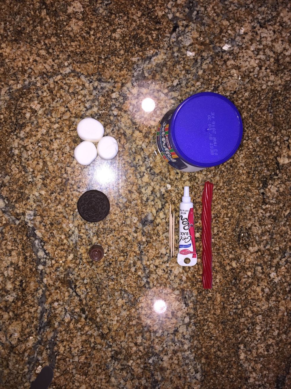 Supplies: - normal sized marshmallows - Oreos - Rolos - pull apart Twizzlers - marshmallow fluff - toothpicks - black icing