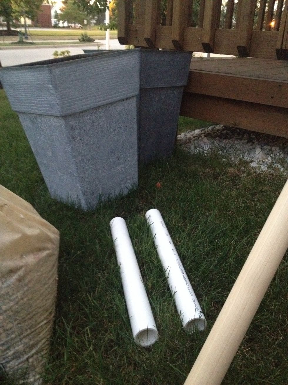 Supplies: planter, PVC pipe, wooden rod, pebbles