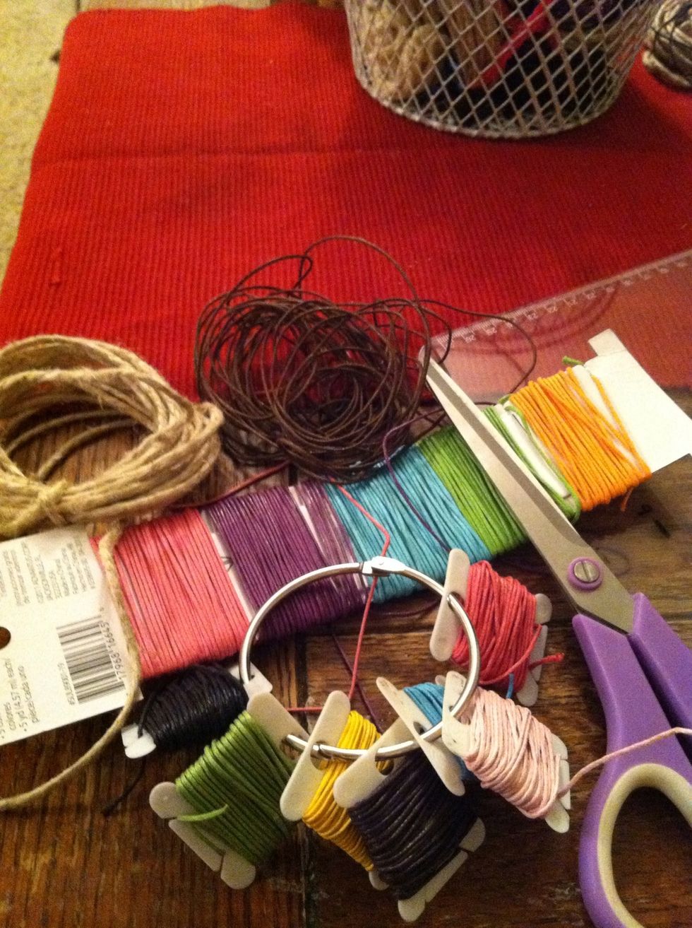 Supplies tab is still giving me trouble. Supplies are: two 75in(ish) lengths of colorful braiding cord, one thick 10in center cord, scissors and a clip board or safety pin.