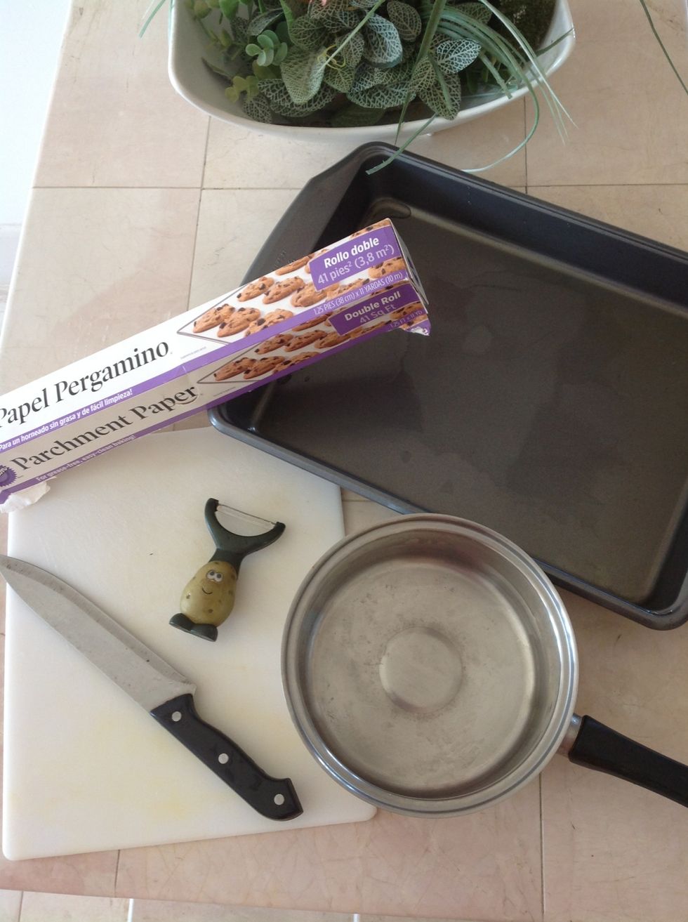 Supplies: tray, pot, wax paper, cutting board, peeler, and knife is optional.