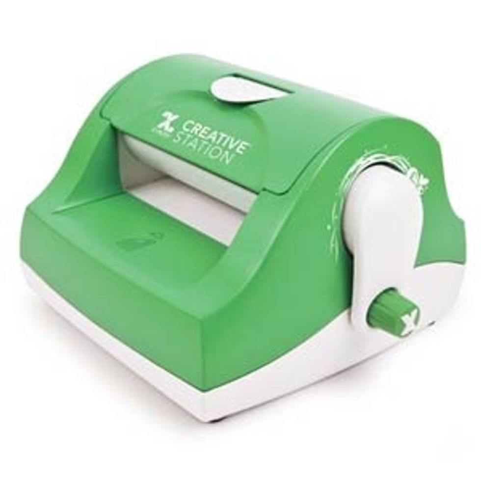 Supply - I ran my collage images, figures, and cutouts through the Xyron...with the exception of the woman added to the front of the small box as only half of her would be attached.