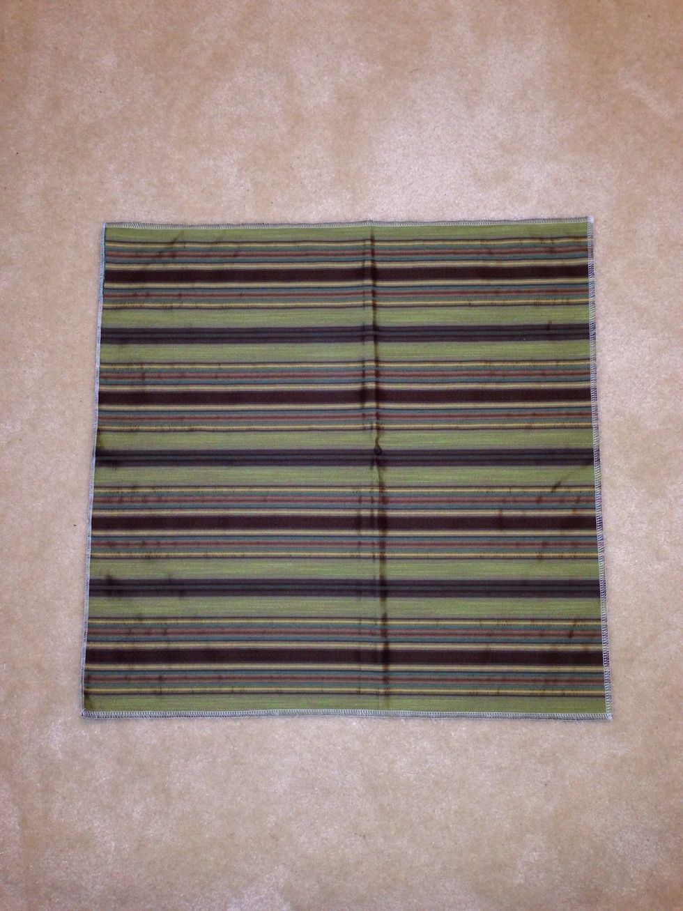 Surge/overlock edges to prevent fraying. This swatch is 21" wide x 22" length.