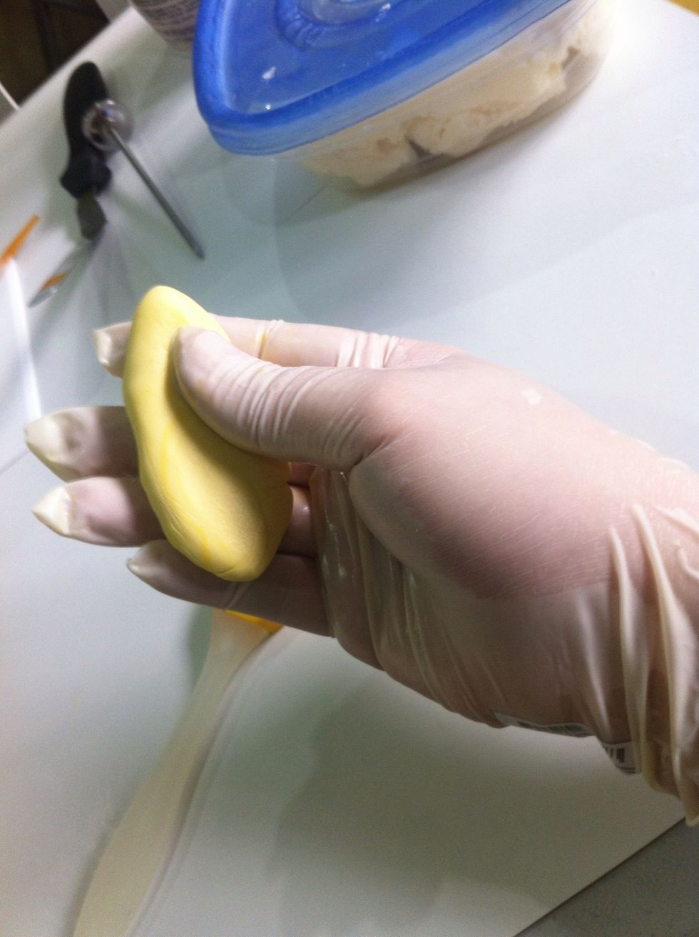 Surgical gloves allows u to easily knead ur gum paste and leaves no mark on ur gum paste while kneading and also for hygiene purposes.