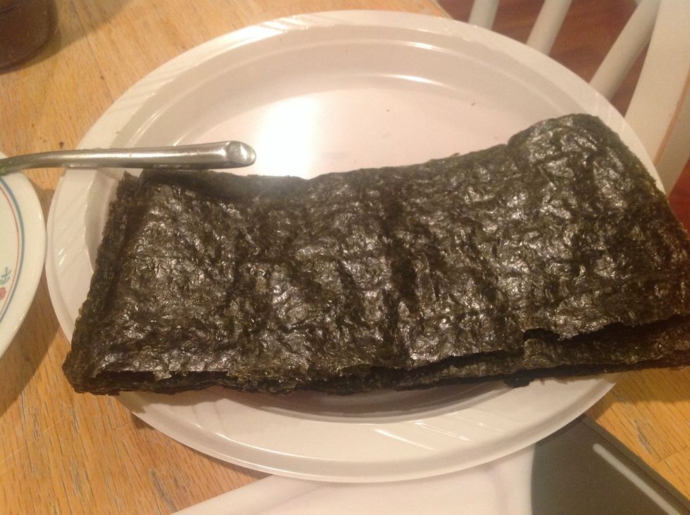 Sushi nori sheets folded in half and split