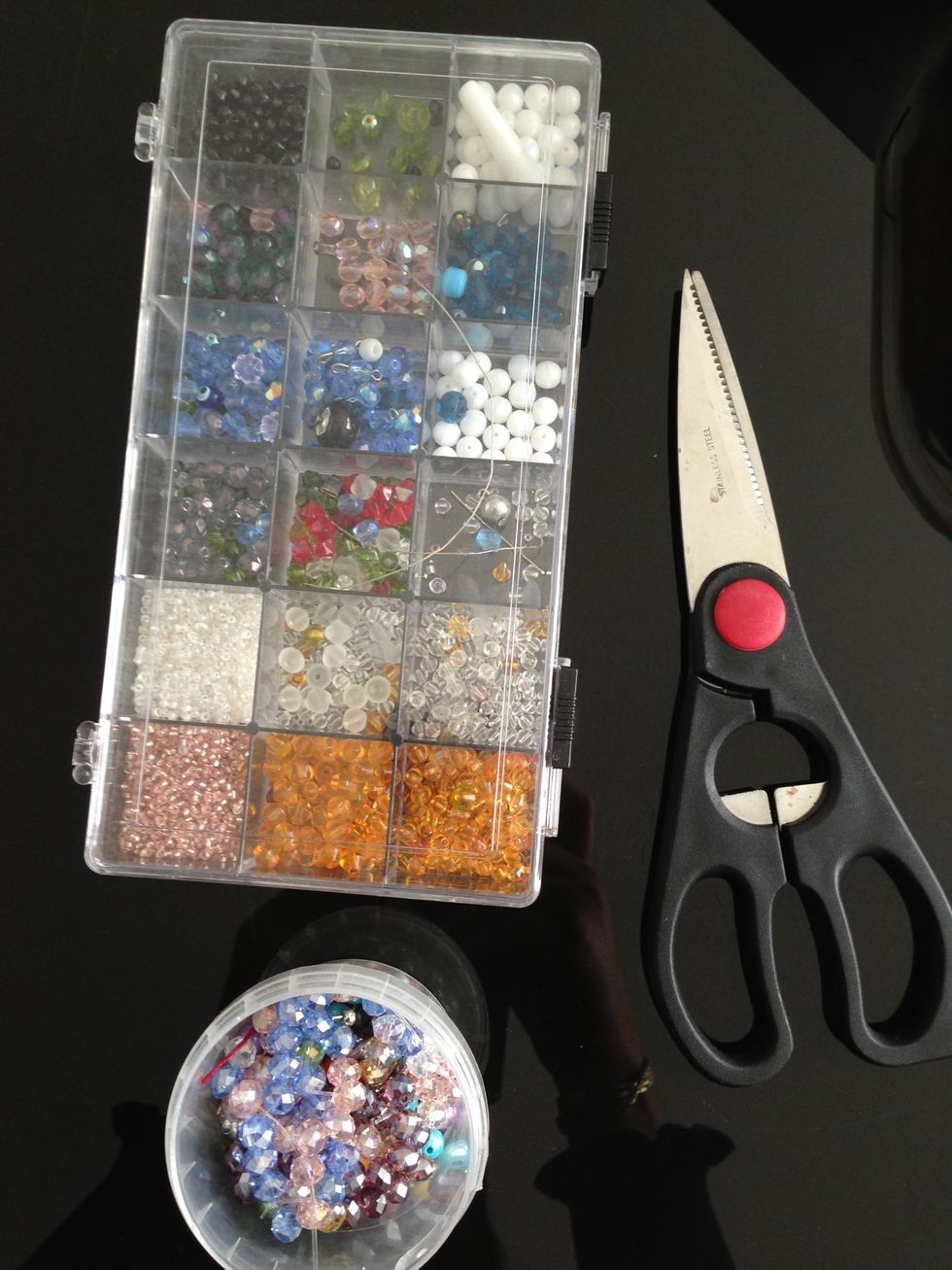 Swarowskie beads, scissor, leather rope