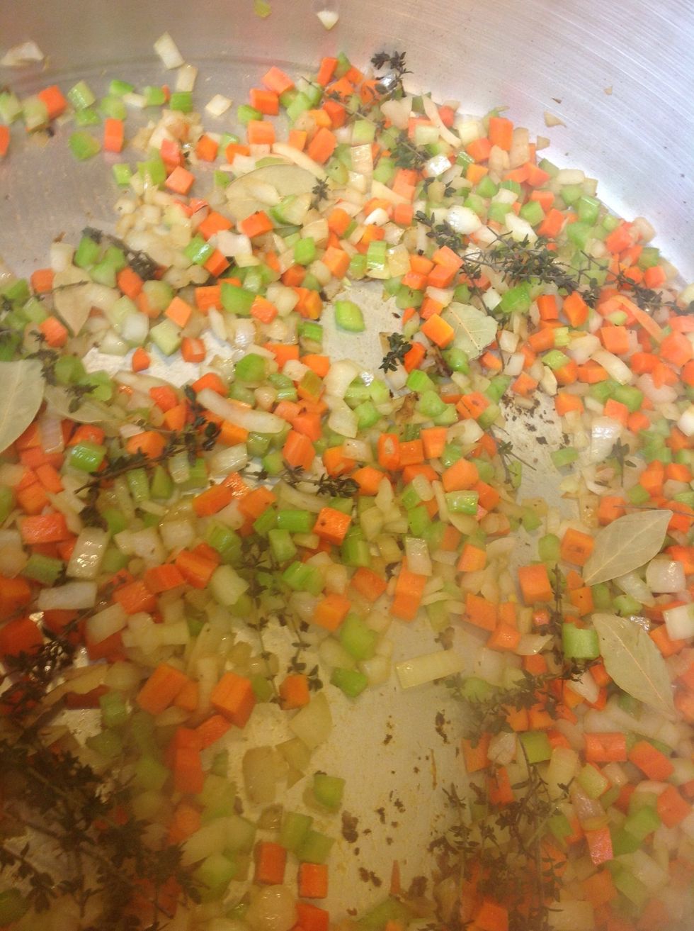 Sweat mire poix, cook down then add herbs and deglaze with red wine