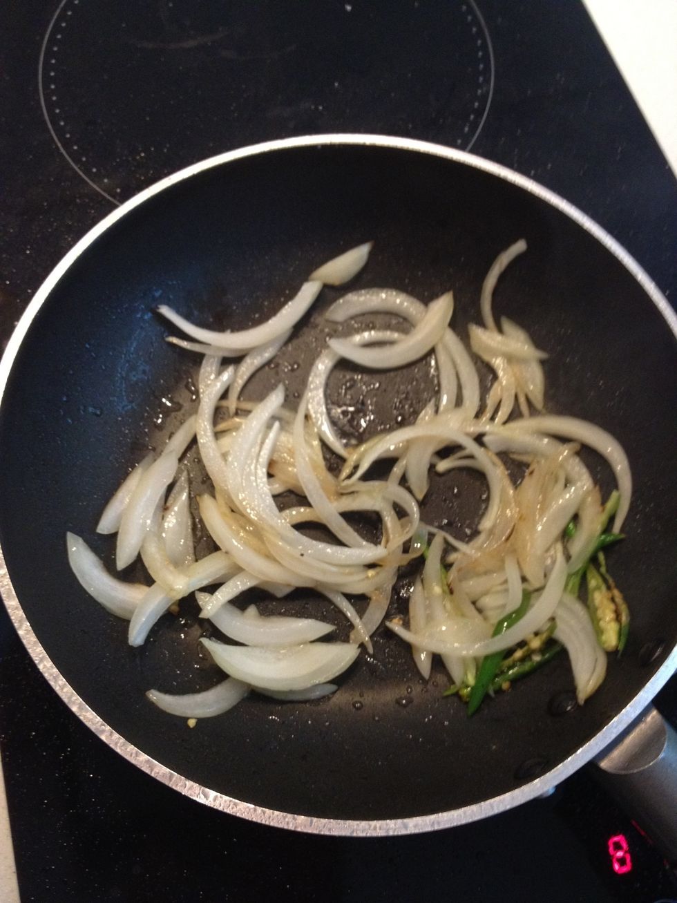 Sweat the onion and chilli until onion browns a little.