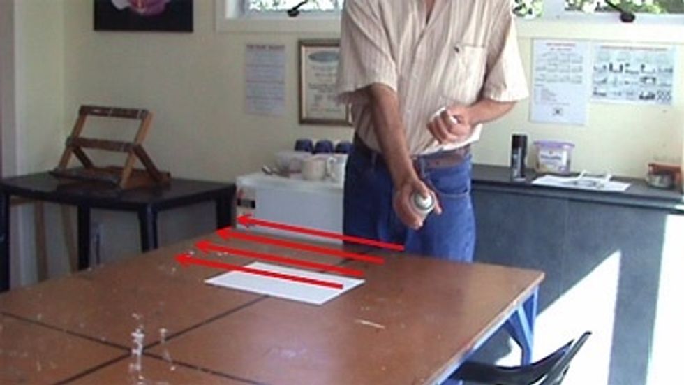 Sweep back and forth systematically to cover the whole sheet evenly and lightly.