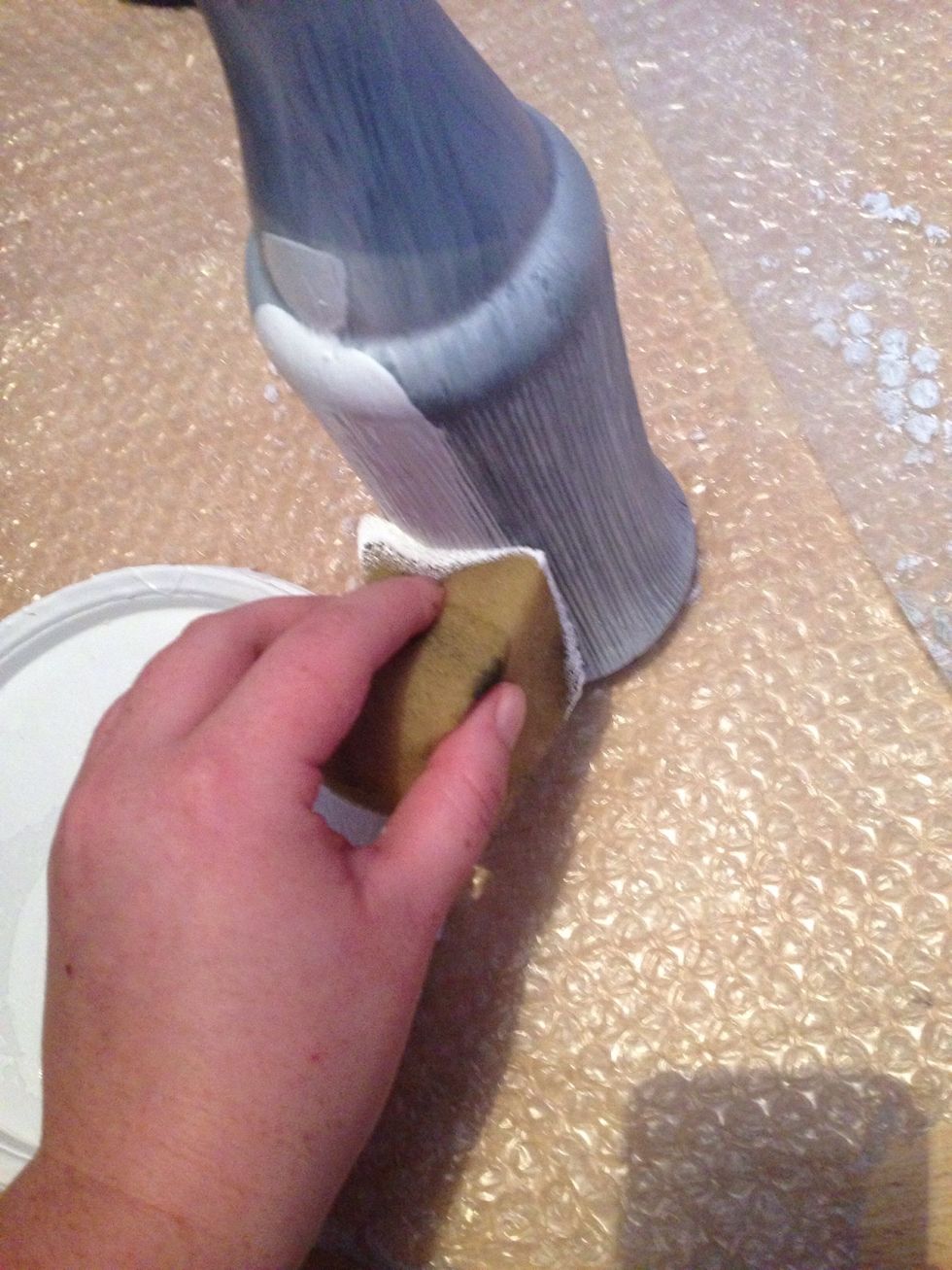 Sweep the sponge across any detail first to make sure the paint takes an even finish