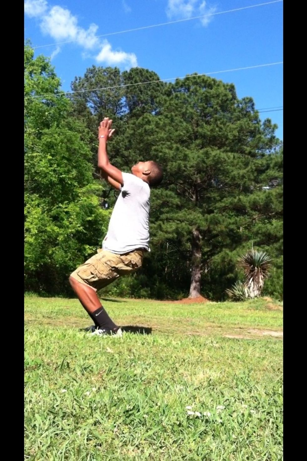 Swing arms forward and pull head,while starting to jump.