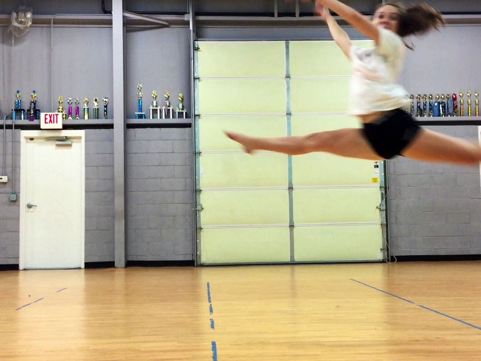 Swing the left leg back. Kick the right leg up.