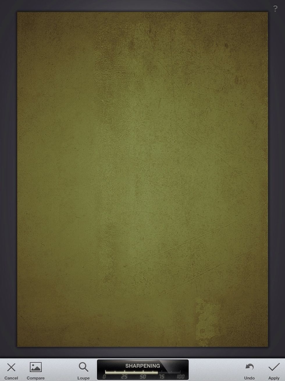 Swipe right to increase sharpness. Dragging a finger up or down on top of an image changes the function of the filter. Drag up to switch to "Structure" mode.