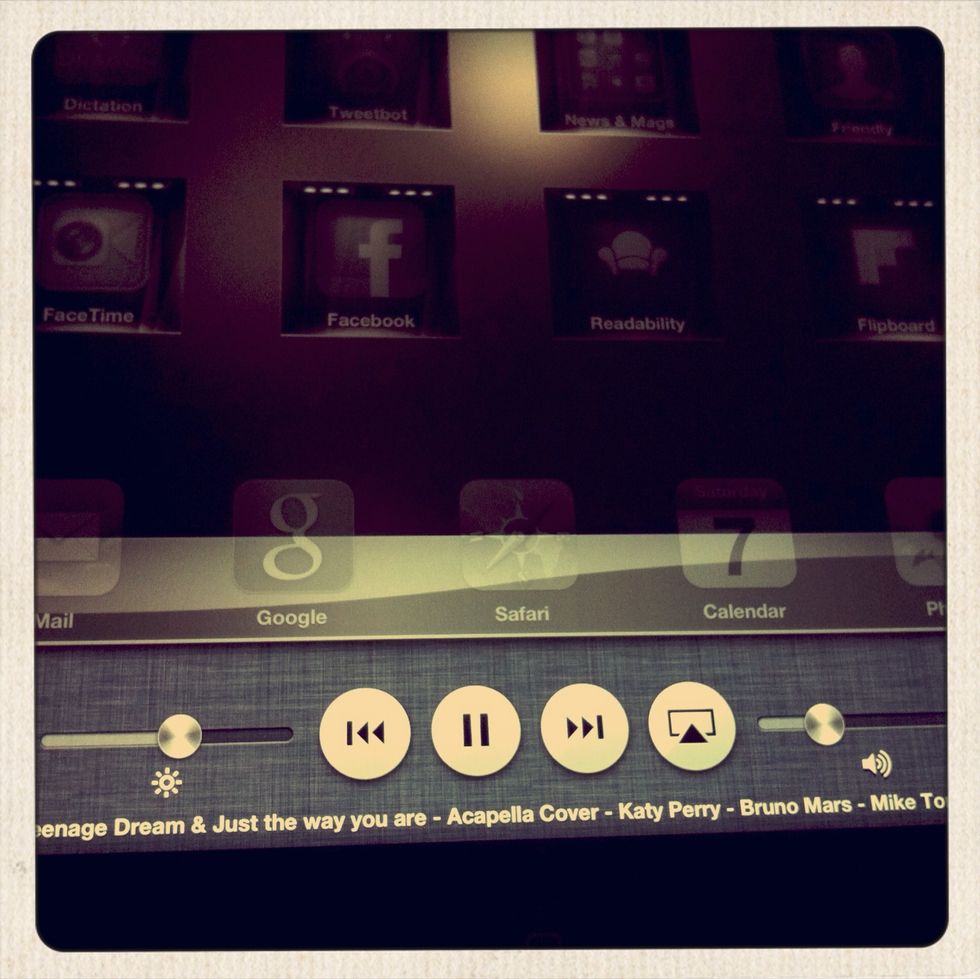 Swipe to the right and you'll see your music controls and the name of the YouTube video playing in your playlist. Hit 'Play' and enjoy :)