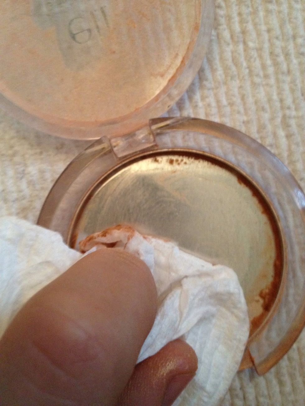Swirl around the paper towel to remove most of the residue.