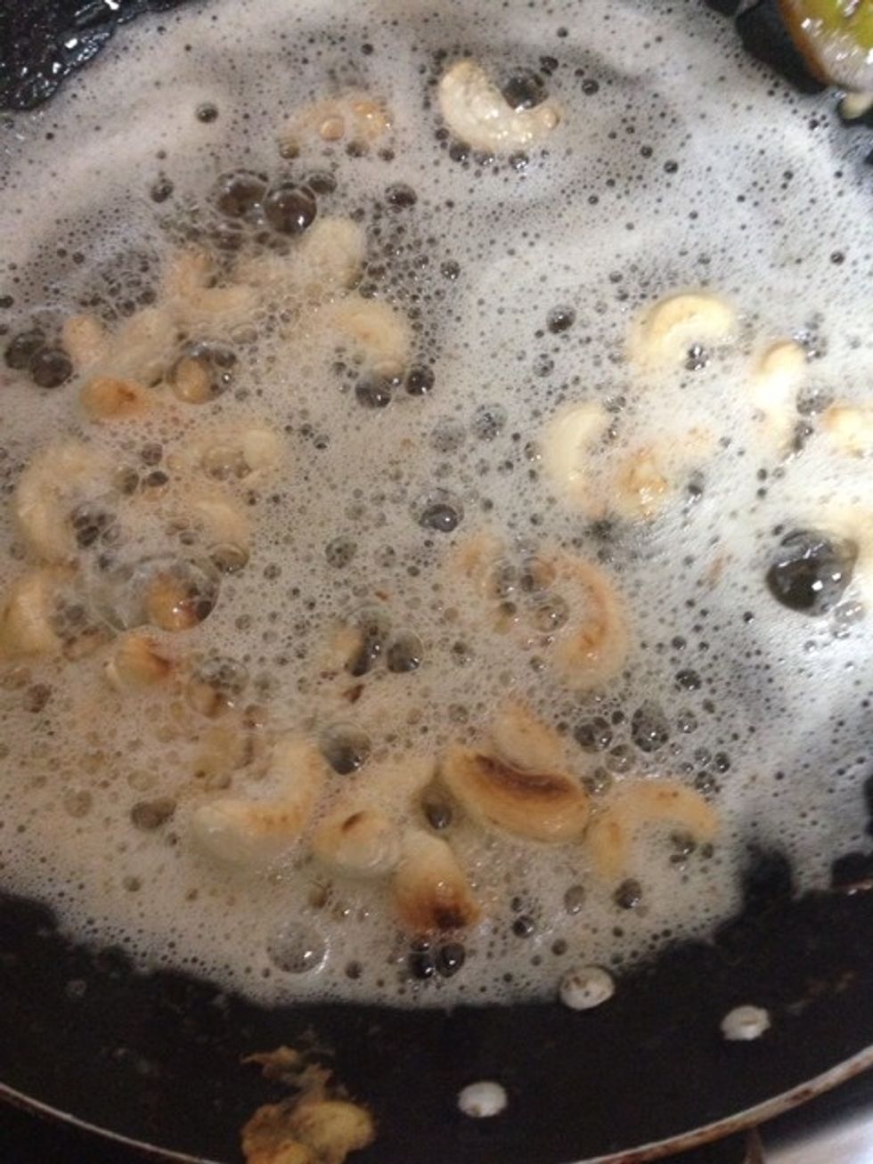 Switch off heat and fry cashew nuts in heat (else it will burn). Froth is because of egg residue.