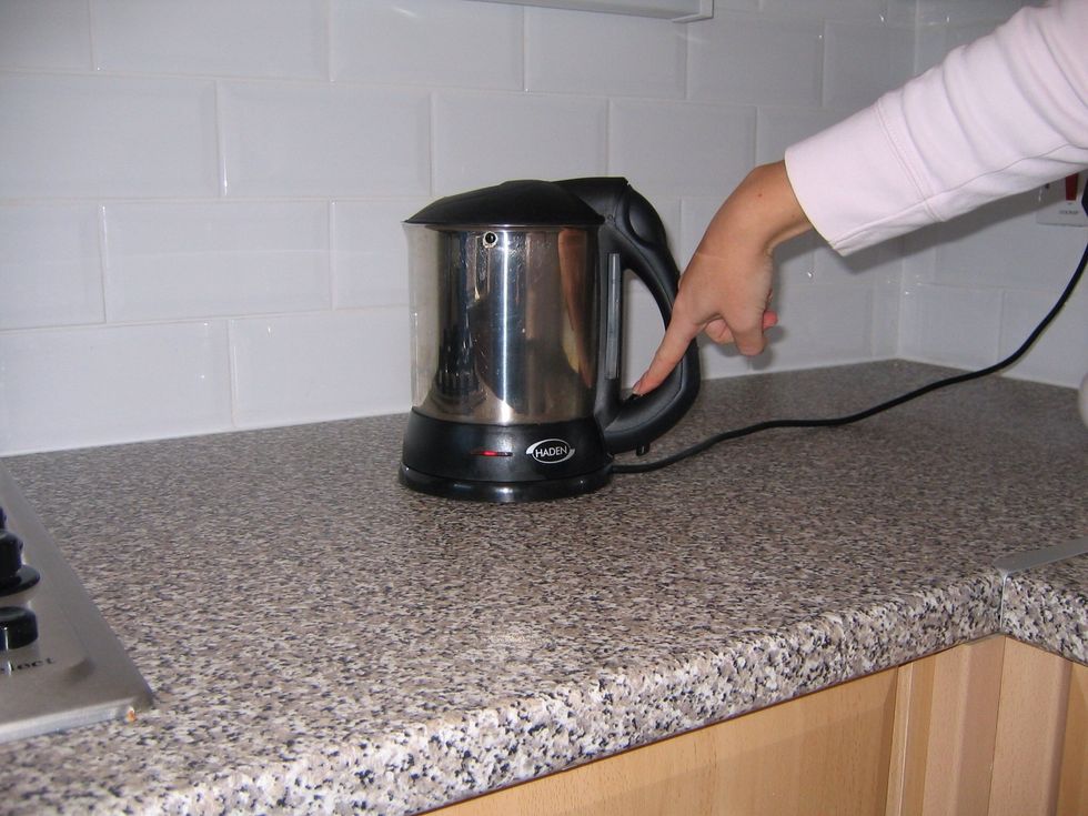 Switch the kettle on.