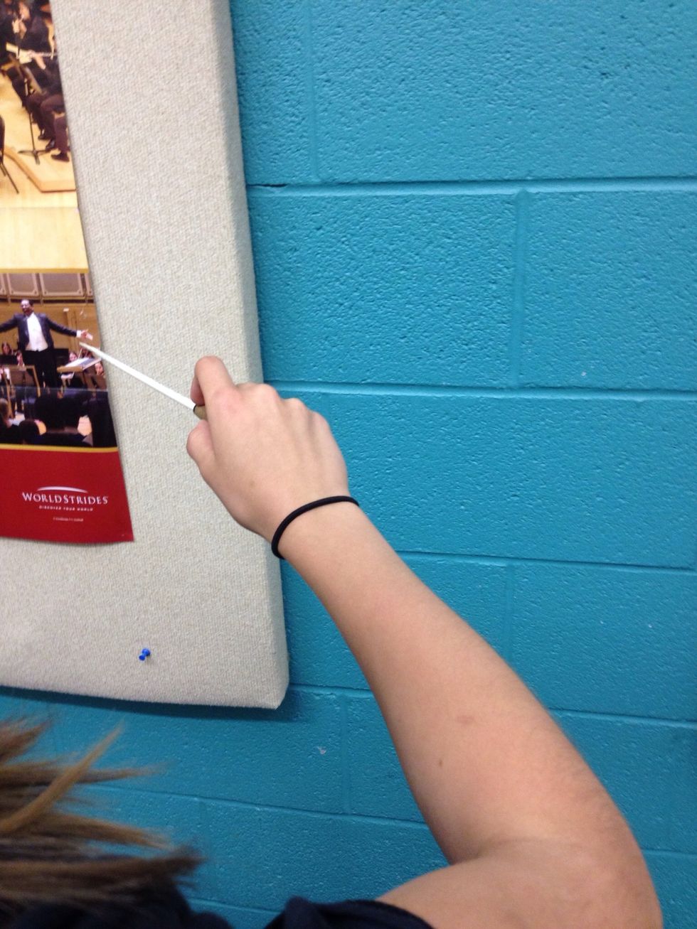 Swoop your hand to the left. Make sure the motion is fluid and natural.