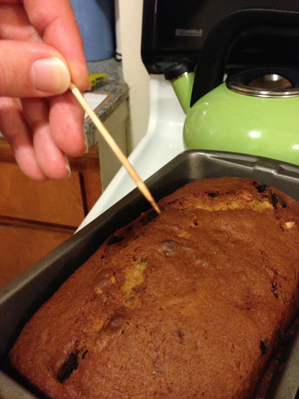 Ta da! A little hard to see but my toothpick has no batter on it - only melted chocolate! Take it out of the oven and let it stand for 10 minutes.