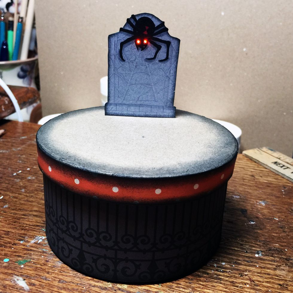 Ta Da! Now you can decorate your grave any way you want to! I used sheet moss to cover the top and added a cute skeleton...