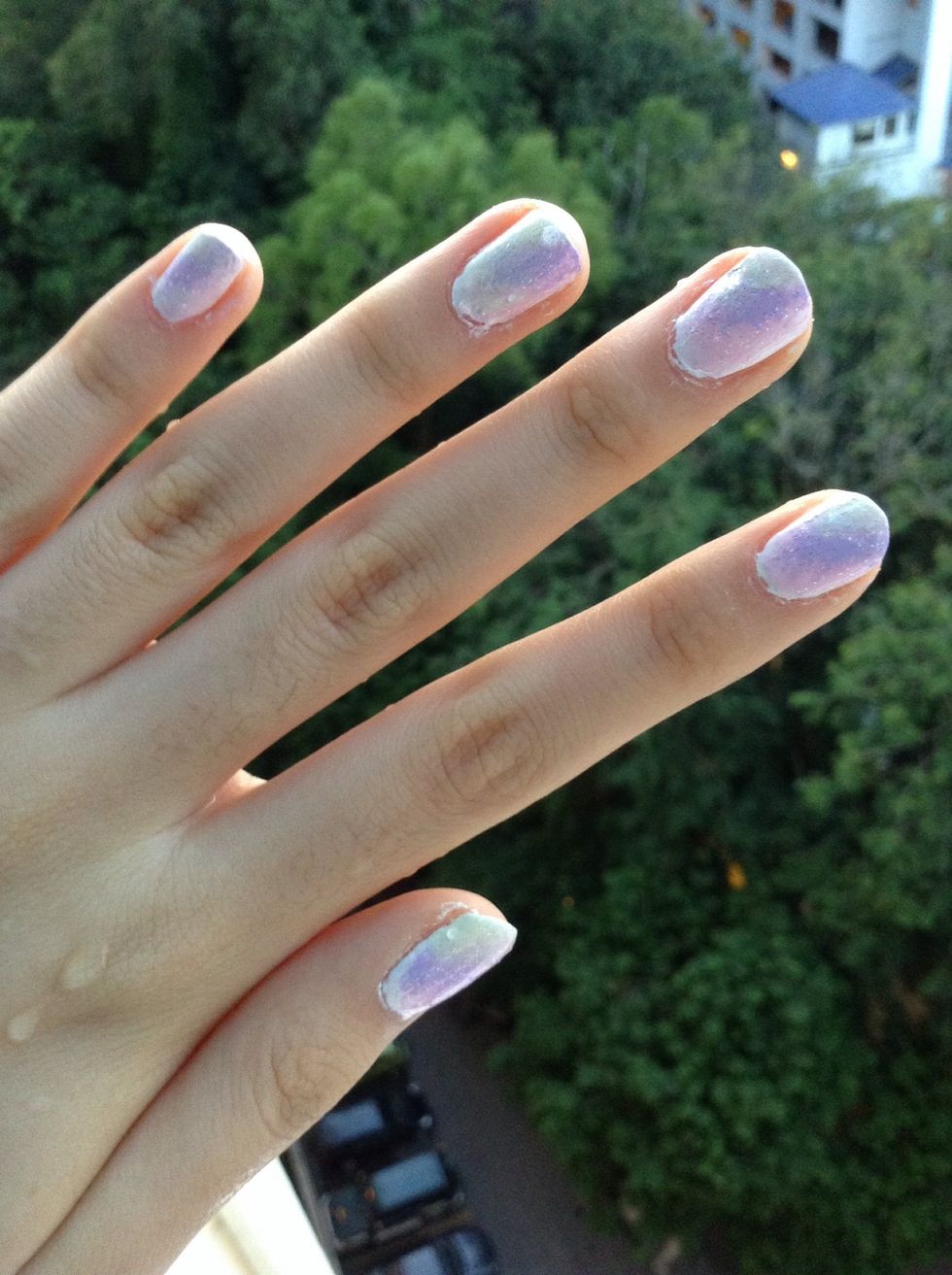 TADA! Clean up Around the edges with some nail polish remover and there you go! Beautiful pastel nails.(Excuse the water droplets I just washed my hands\ud83d\ude1c)