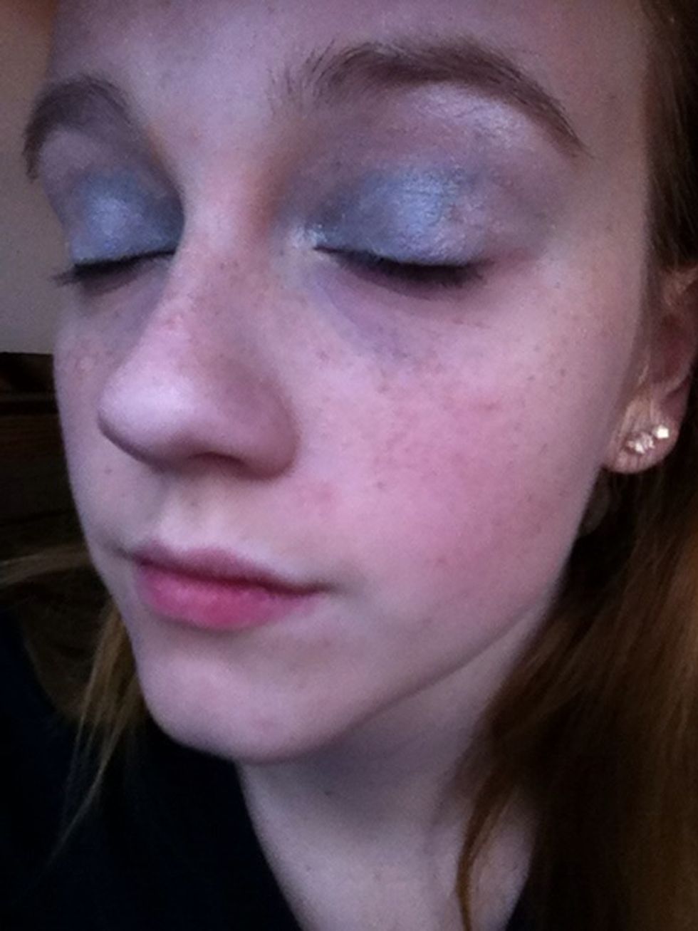 Tada! Ok, now onto the blue! I'm using a glitter/gel eyeshadow from Hard Candy. We'll start with the eyelid. Fill in the spot next to the silver on your outer lid, and blend.