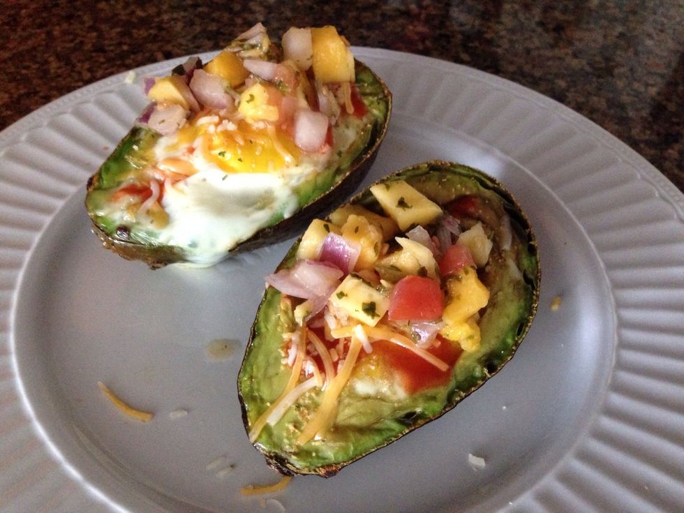 Tada!! Serve with whatever toppings your heart desires. I added hot sauce, mango salsa and sprinkled some shredded cheese on top :)