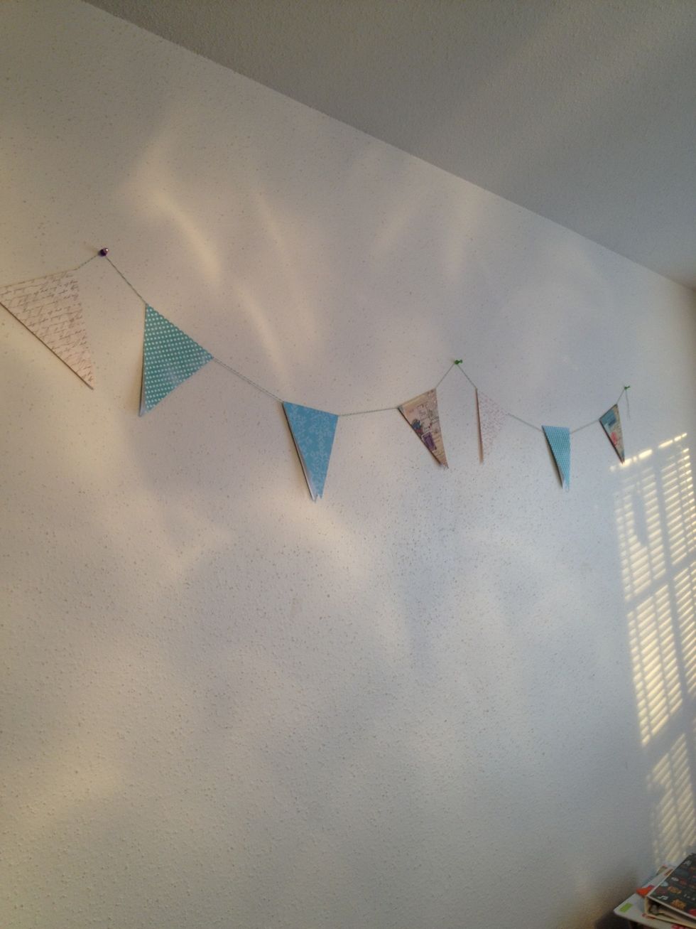 Tadaaa! Finished product. Looks better at a party! You can personalize each triangle by adding a letter to each one to spell out something or adding photos.