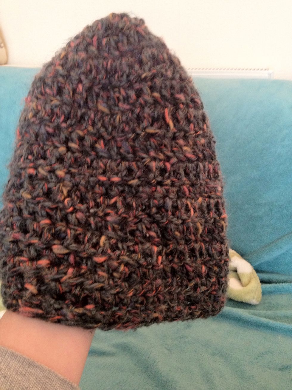 Tadah! Finished hat. To finish, tie off your yarn (how you prefer), cut and weave in your tails. Then you can wear your creation, or embellish it further!
