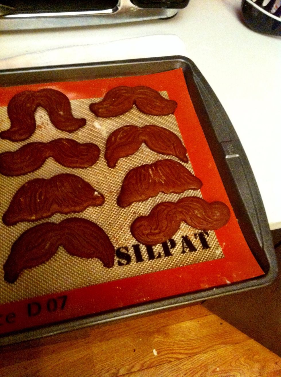 Tah-dah! Mustache cookies done! Let the cookies cool on the cookie sheet. Just one more important step...