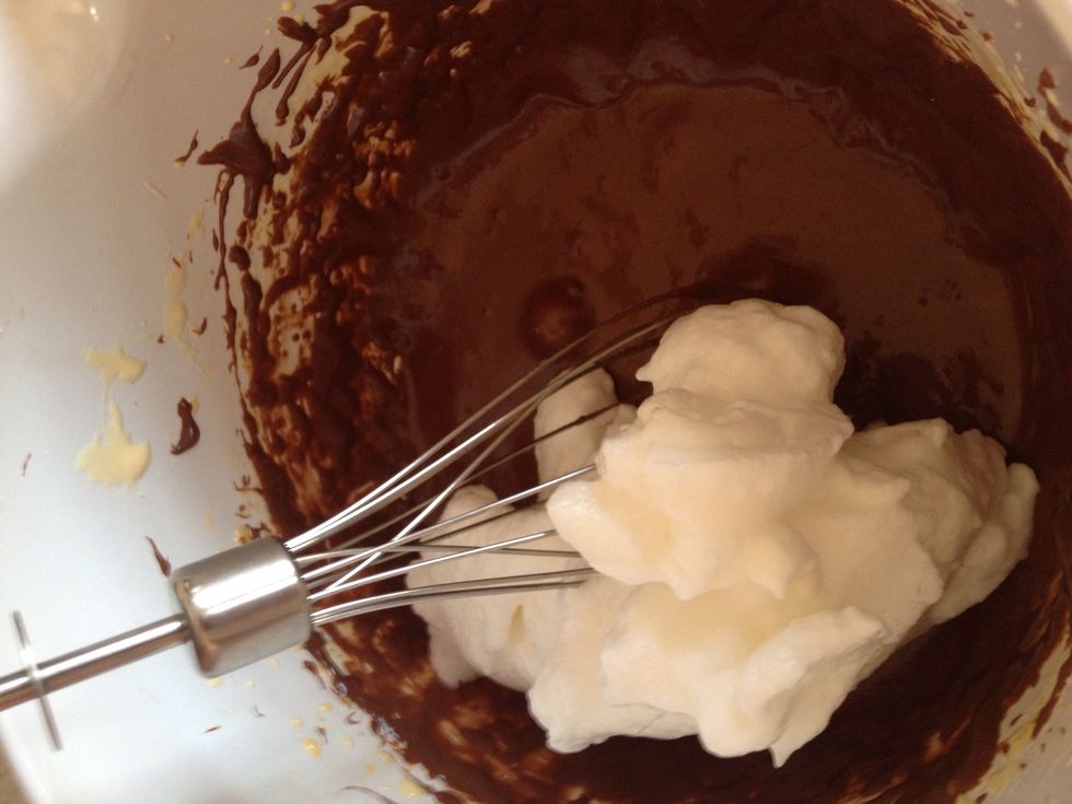 Take 1/3 of the egg whites and mix.
