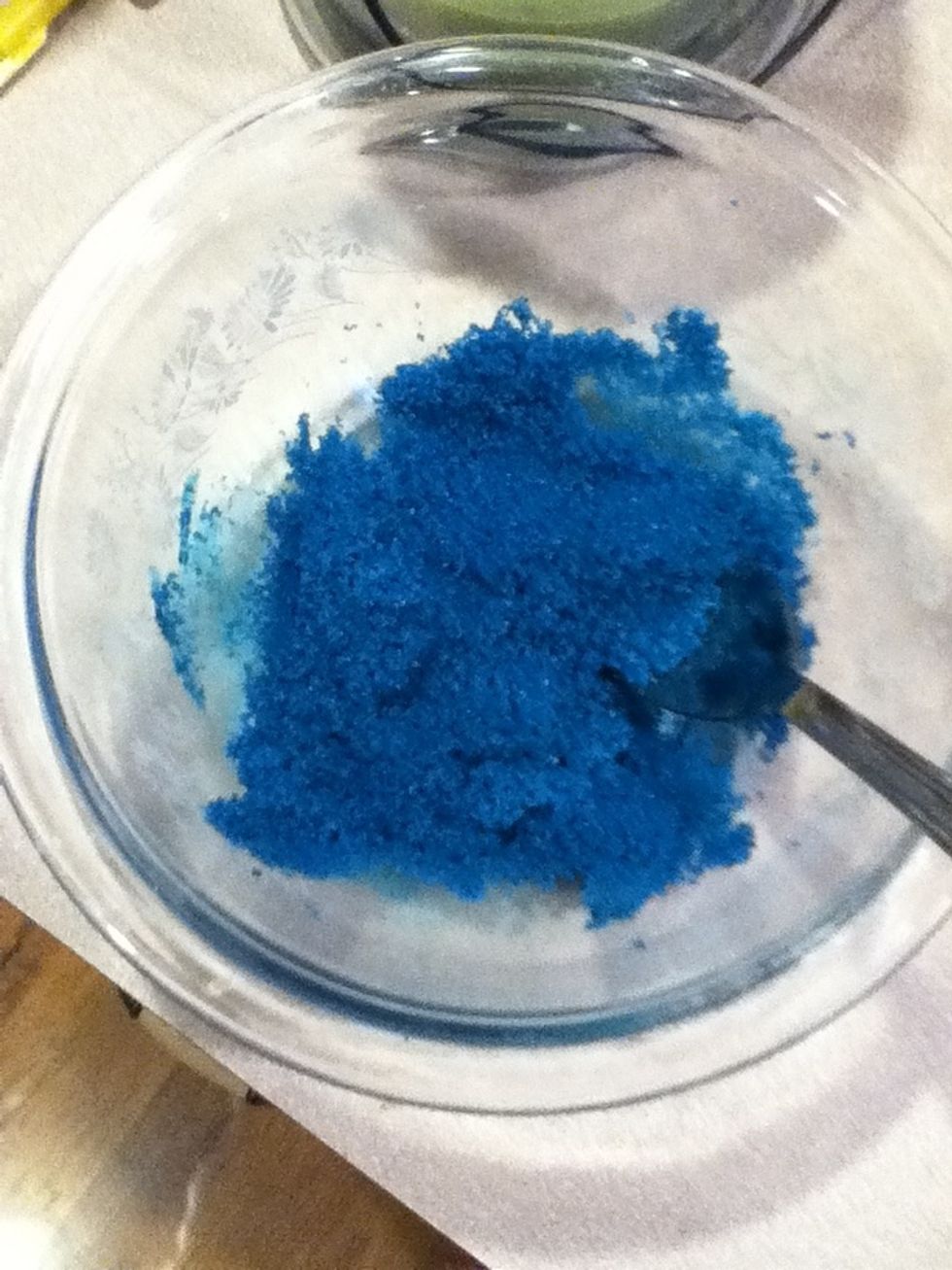 Take 1/4 cup of salt and 1/2 a teaspoon of food coloring and mix them together in a bowl. Make sure it's blended well