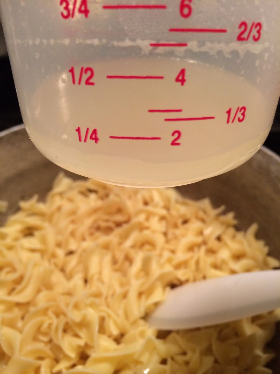 Take 1/4 cup of the broth