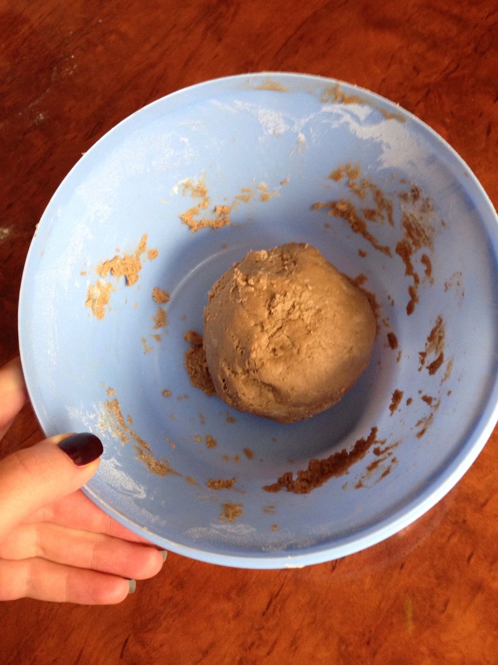 Take 1/4 of the dough , add a little bit of coca powder and as much flour until you get a firm dough