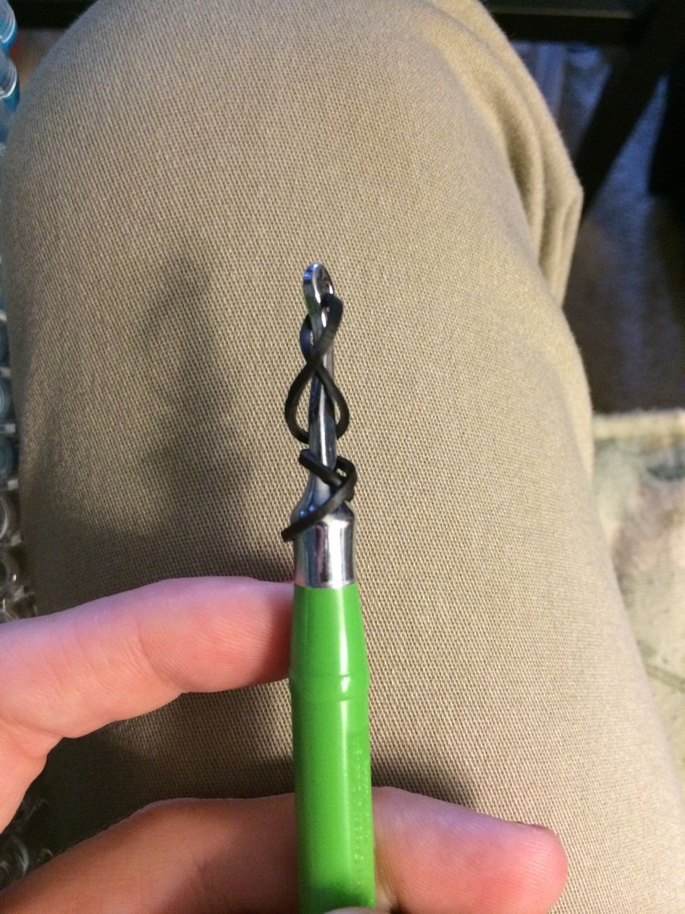 Take 1 black band and wrap it around your hook twice. Take a 2nd one and do the same thing.