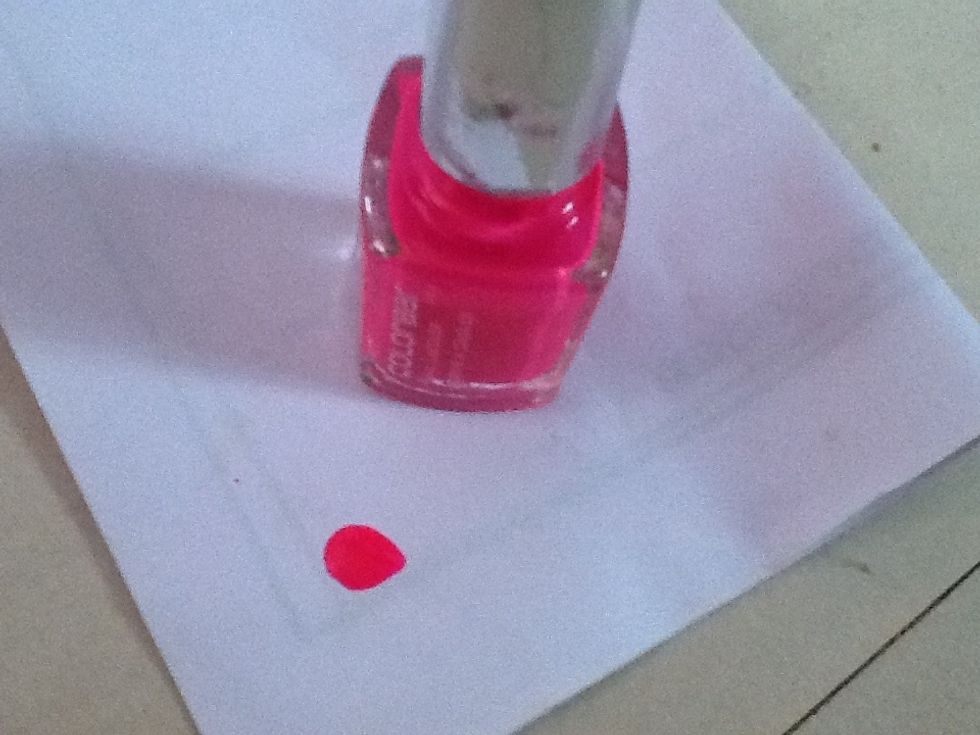 Take 1 drop of one color on a piece of paper or any other surface