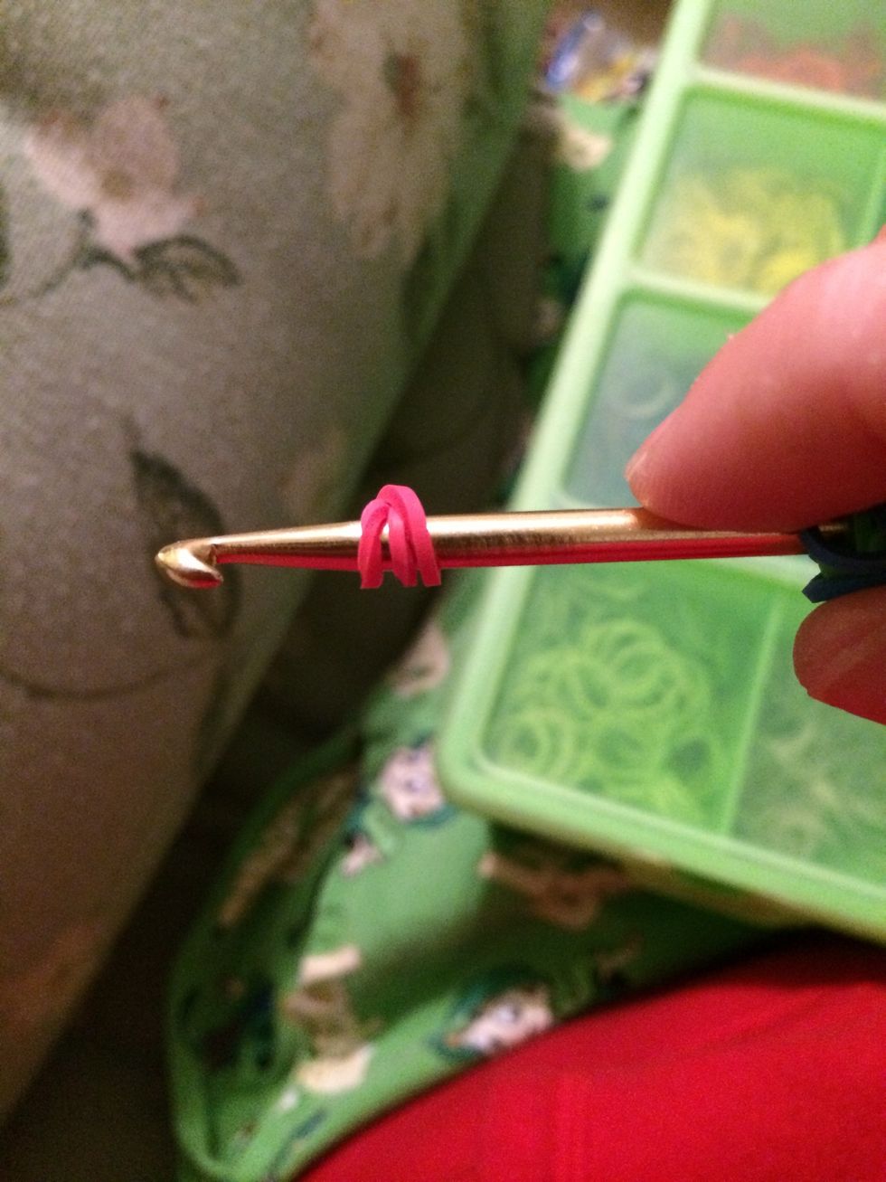 Take 1 red band and wrap it around your hook three times.