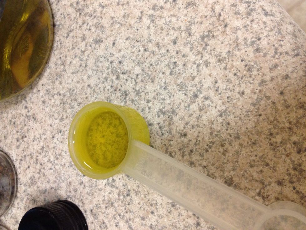 Take 1 tbsp olive oil and drizzle over edamame