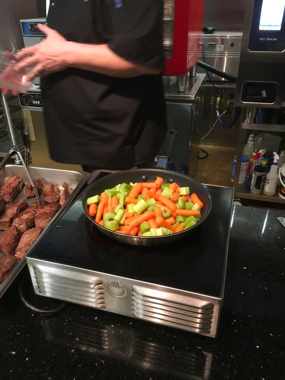 Take 2 cups of carrots, and 2 cups of celery and breakdown until slightly soft. Spread evenly over beef ribs.