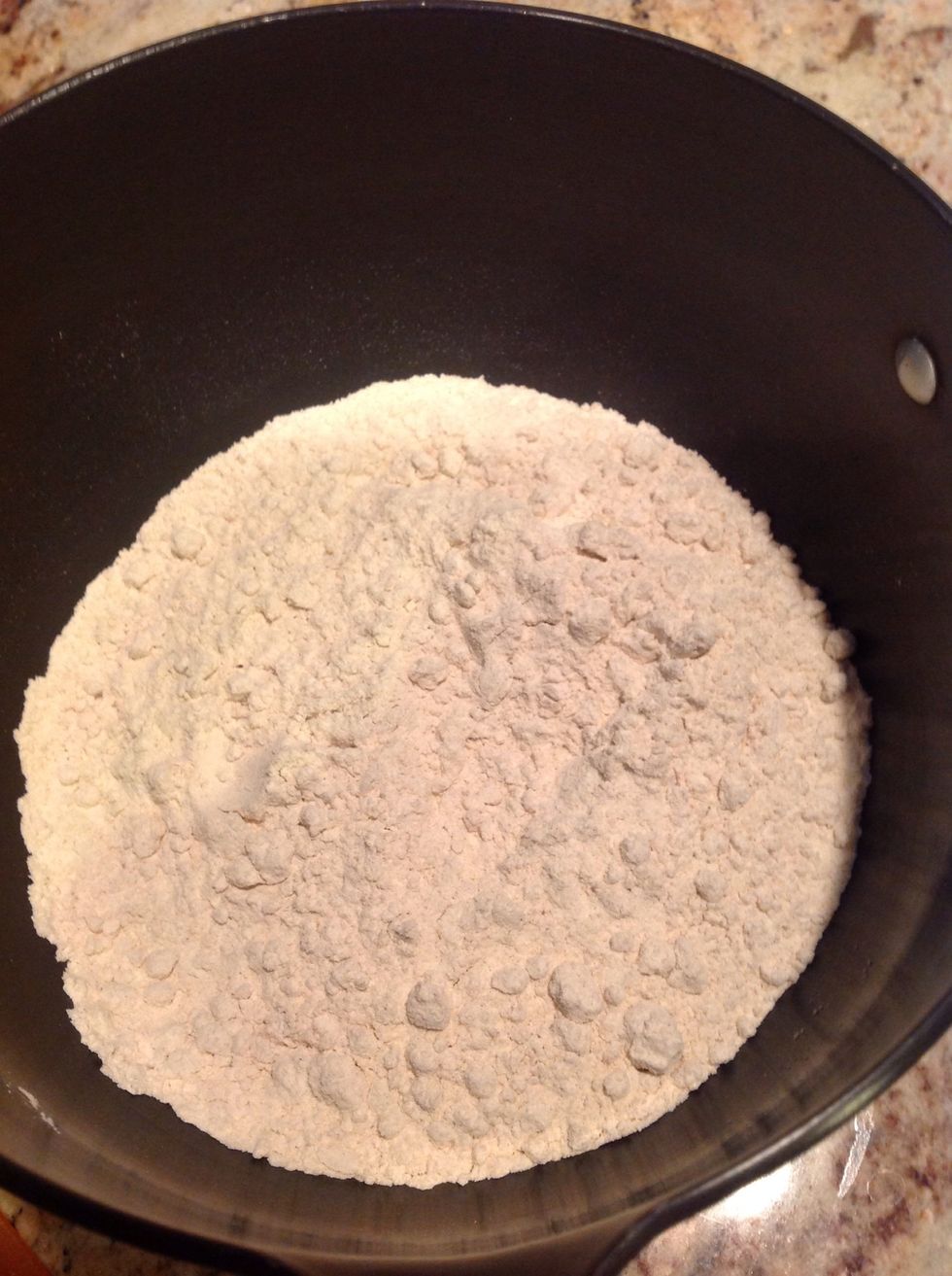 Take 2 cups wheat flour (or multi-grain flour) in a mixing bowl.