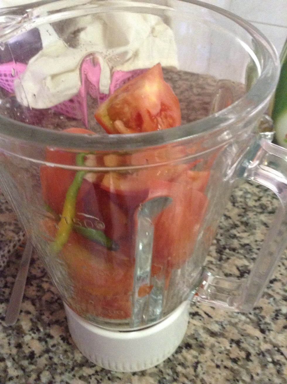 Take 3 large tomatoes and 5 green chilly blend together