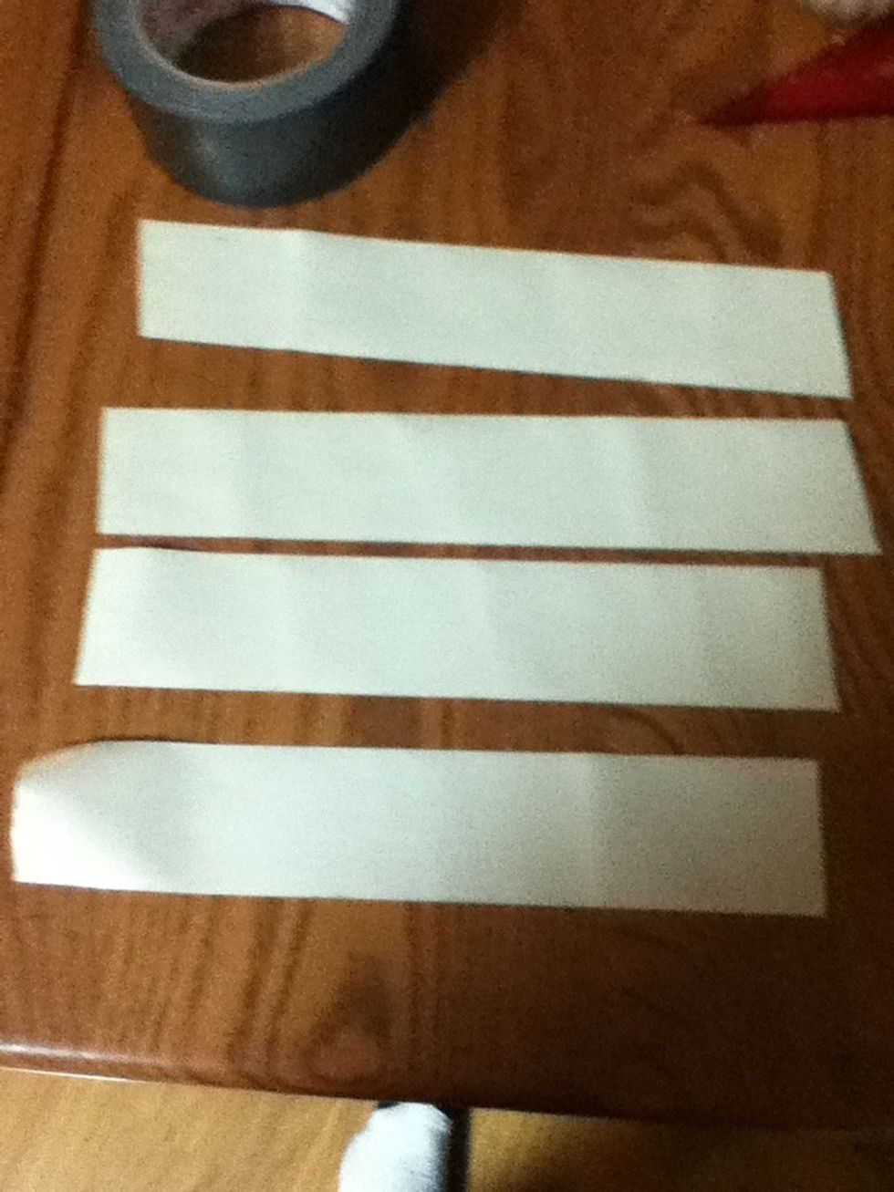 Take 4 8 inch pieces of duct tape