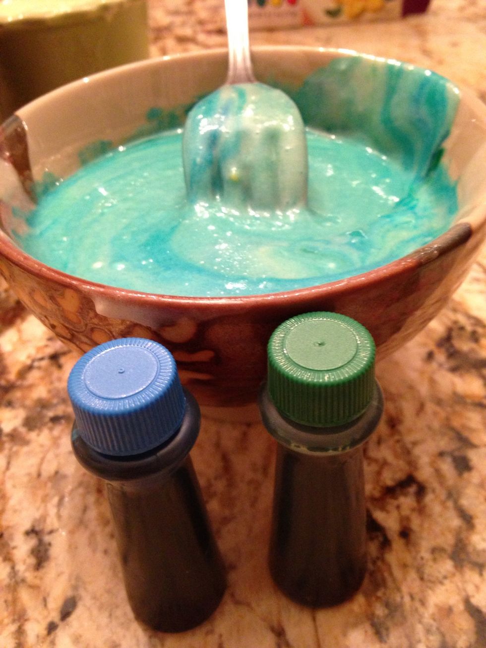 Take 4 blue drops, 1 green drop . To make "Aztec Blue"