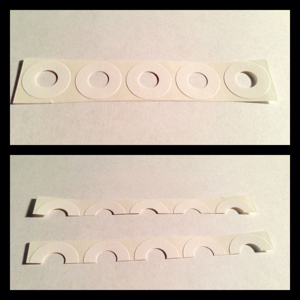 Take 5 paper reinforcements and cut them in half. ( you can just use 10 whole ones but I find that half is enough)